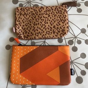 Ipsy Tetris and cheetah print makeup pouches